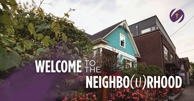 Blue house beside a church building with flowers in front and Welcome to the Neighbourhood text overlay.