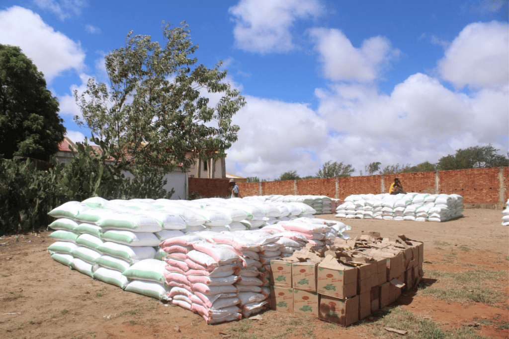 Stacks of food supplies including rice and other essentials in Madagascar.