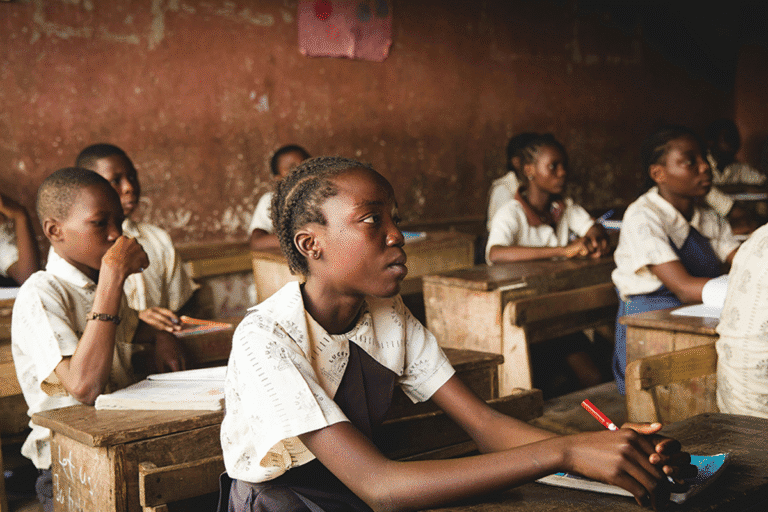 Children in classroom learning environment for World Renew.