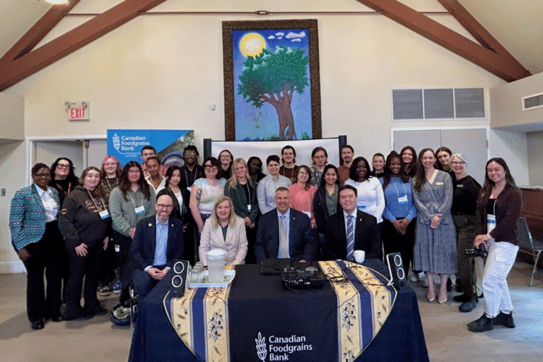 Group photo of diverse community members at World Renew event.