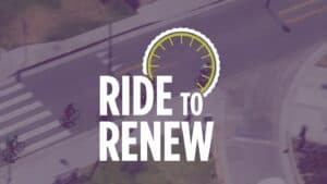 Ride to Renew logo over an aerial view of cyclists travelling through a road intersection.
