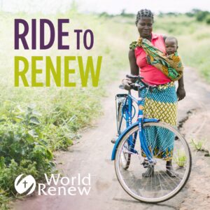 Woman with child and bicycle on rural path for Ride to Renew.