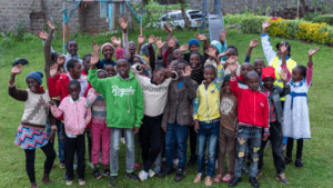 Children participating in a running club in Kenya for community development.