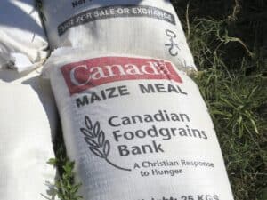 Sack of Canadian maize meal from Canadian Foodgrains Bank for food aid.