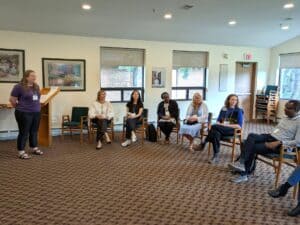 Group of diverse people participating in a discussion at Kentro 2026 Forum.