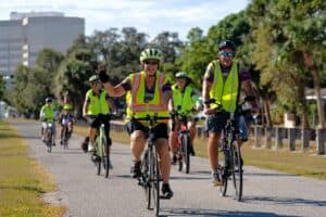 Group of cyclists participating in Ride to Renew event for charity.