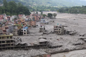 Colourful Nepalese buildings are hollowed out and flooded due to monsoons.